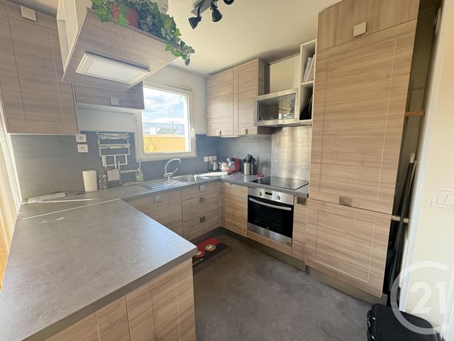 Afficher la photo en grand Appartement F3 à vendre - 3 pièces - 70.0 m2 - LA PLAINE ST DENIS - 93 - ILE-DE-FRANCE - Century 21 Wilson Immobilier